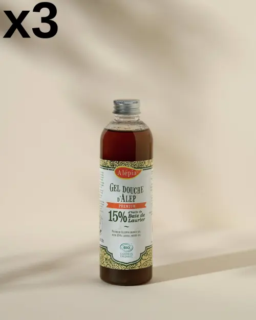 Set van 3 biologische Aleppo-douchegels met 15% laurier van Alepia, fles met amberkleurige vloeistof met vermelding x3