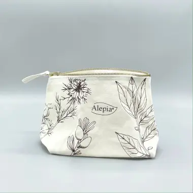 Trousse Alepia in cotone grezzo con chiusura zip, ornata di illustrazioni botaniche nere