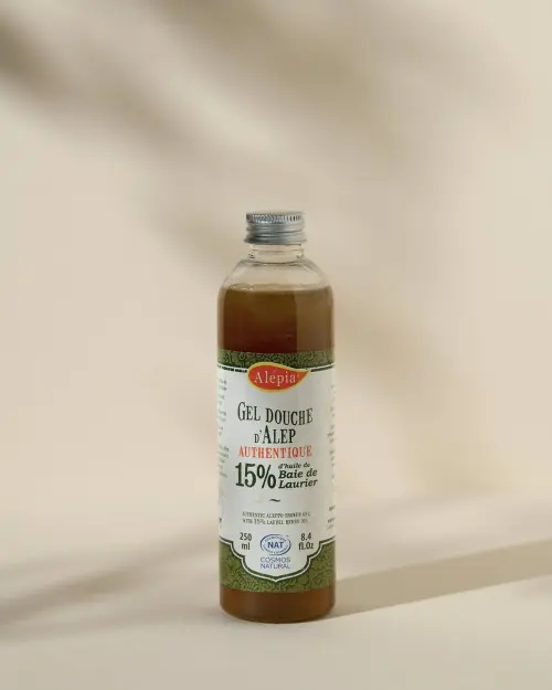 Authentieke Aleppo-douchegel 15% laurier van Alepia in transparante flacon van 250 ml met zilveren dop